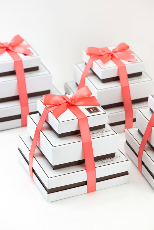 chocolate gift towers tied with pink ribbon